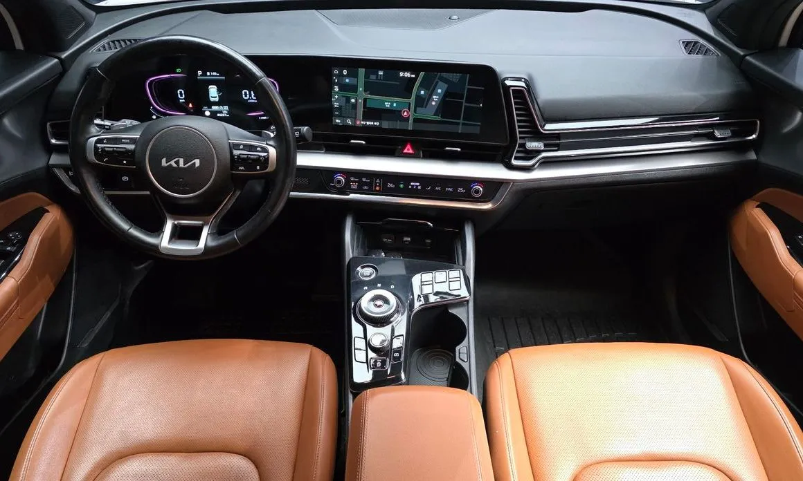 Kia Sportage — фото 9