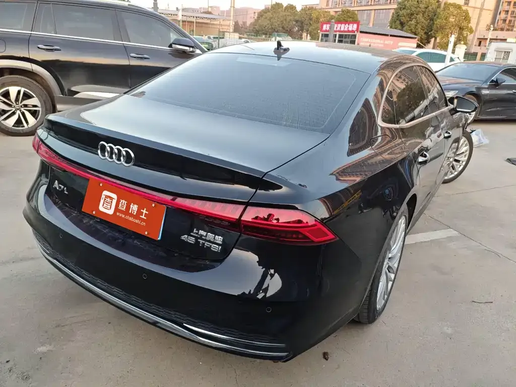 Audi A7L — фото 8