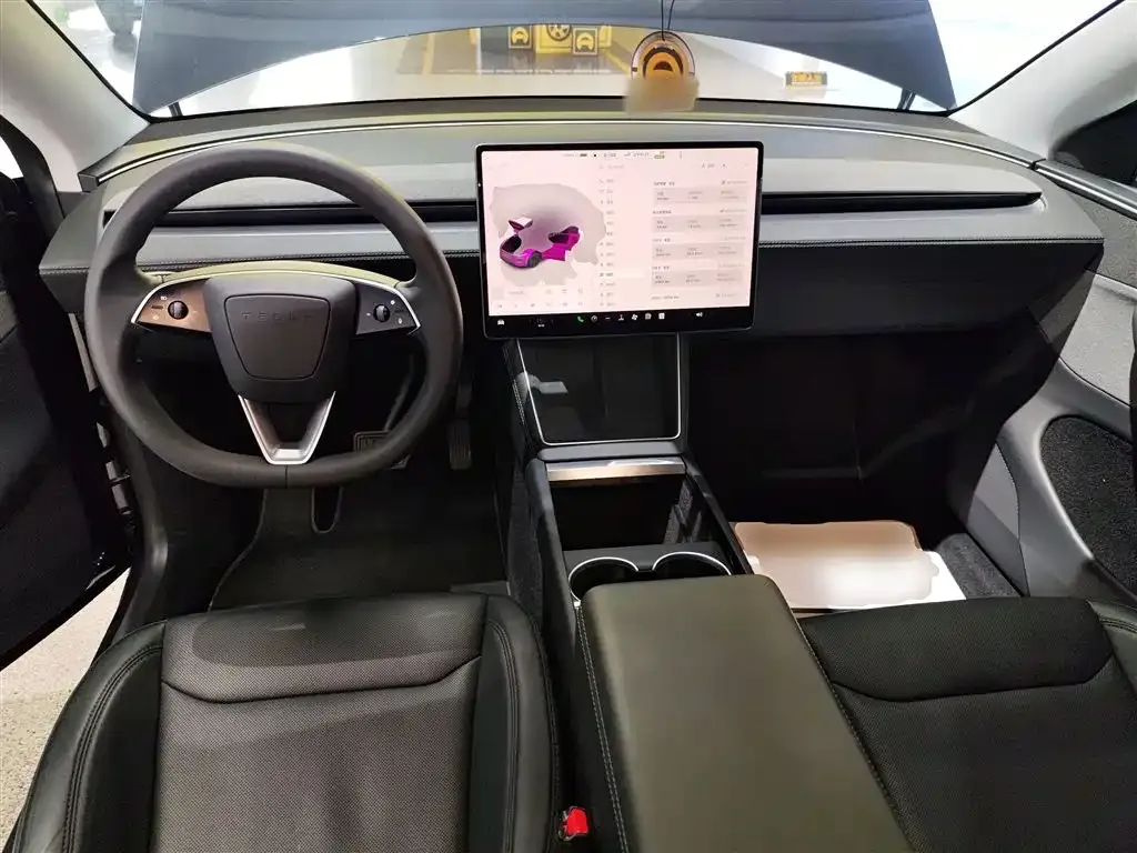 Tesla Model Y — фото 9