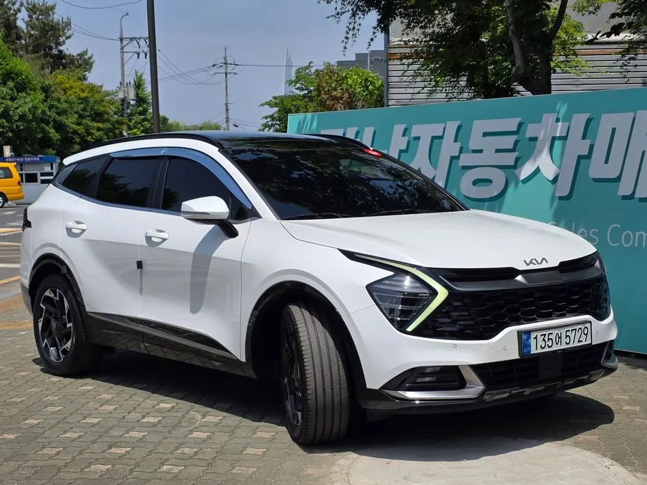 Kia Sportage — фото 1