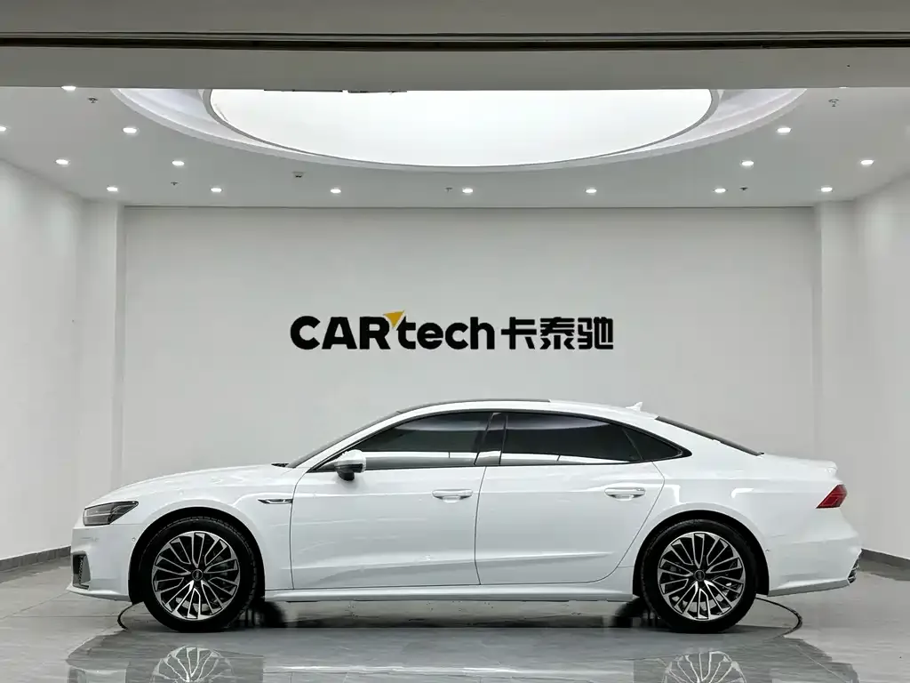Audi A7L — фото 7