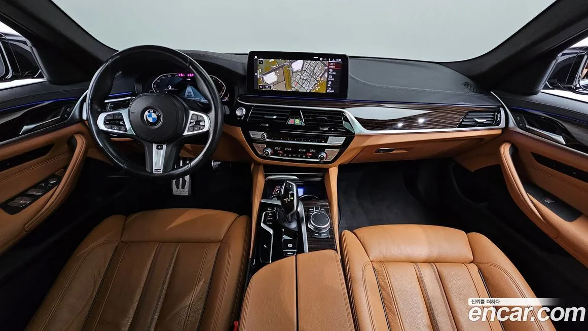 BMW 5-Series — фото 10