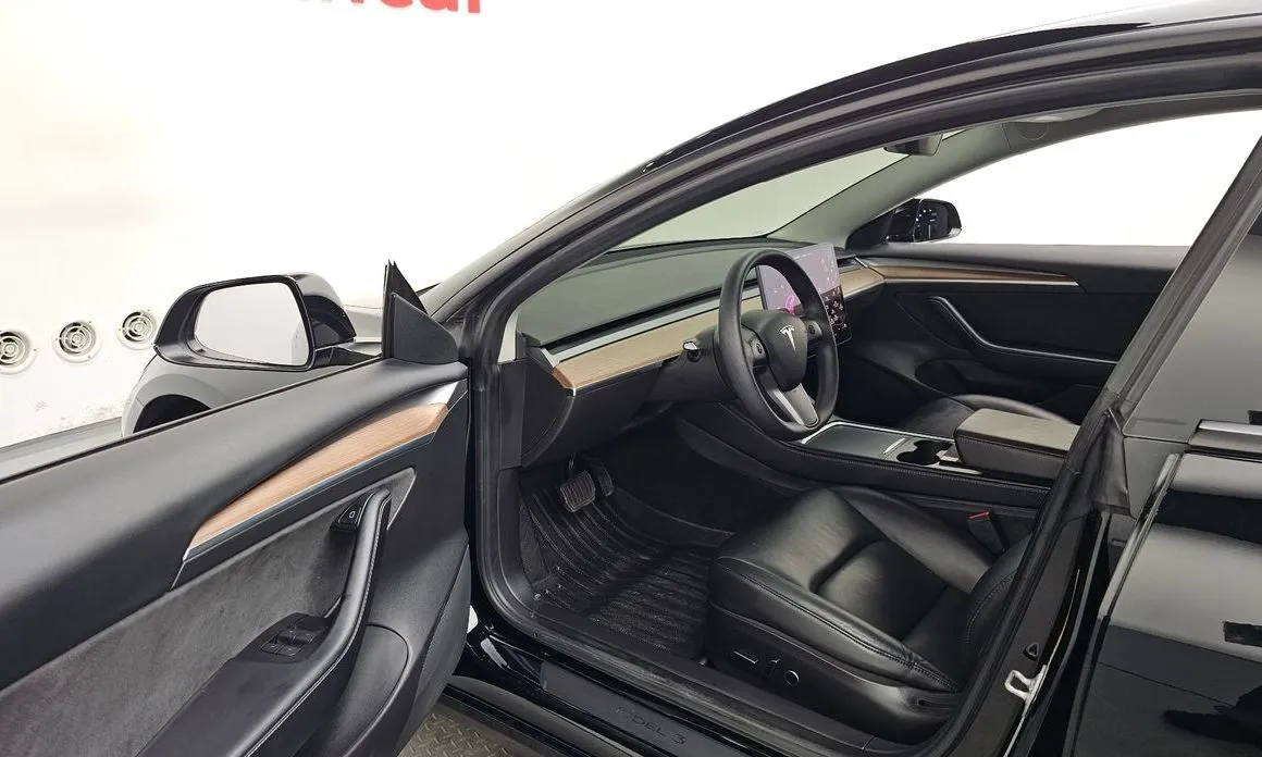 Tesla Model 3 — фото 10