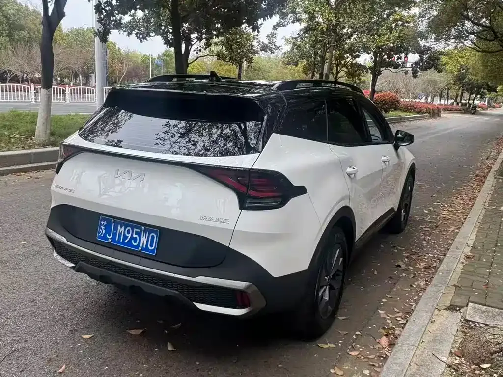 Kia Sportage — фото 8