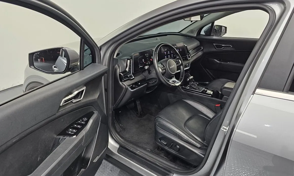 Kia Sportage — фото 8