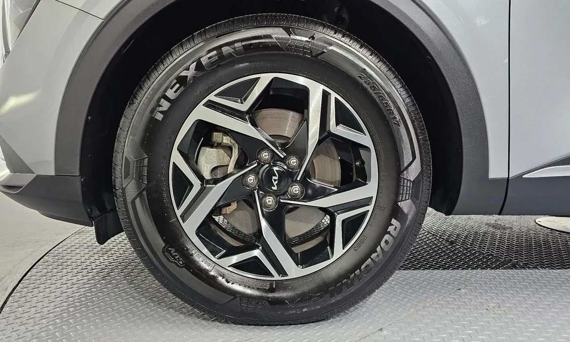 Kia Sportage — фото 10