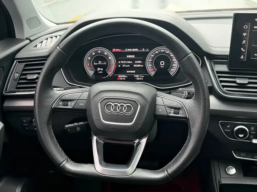 Audi Q5L — фото 9