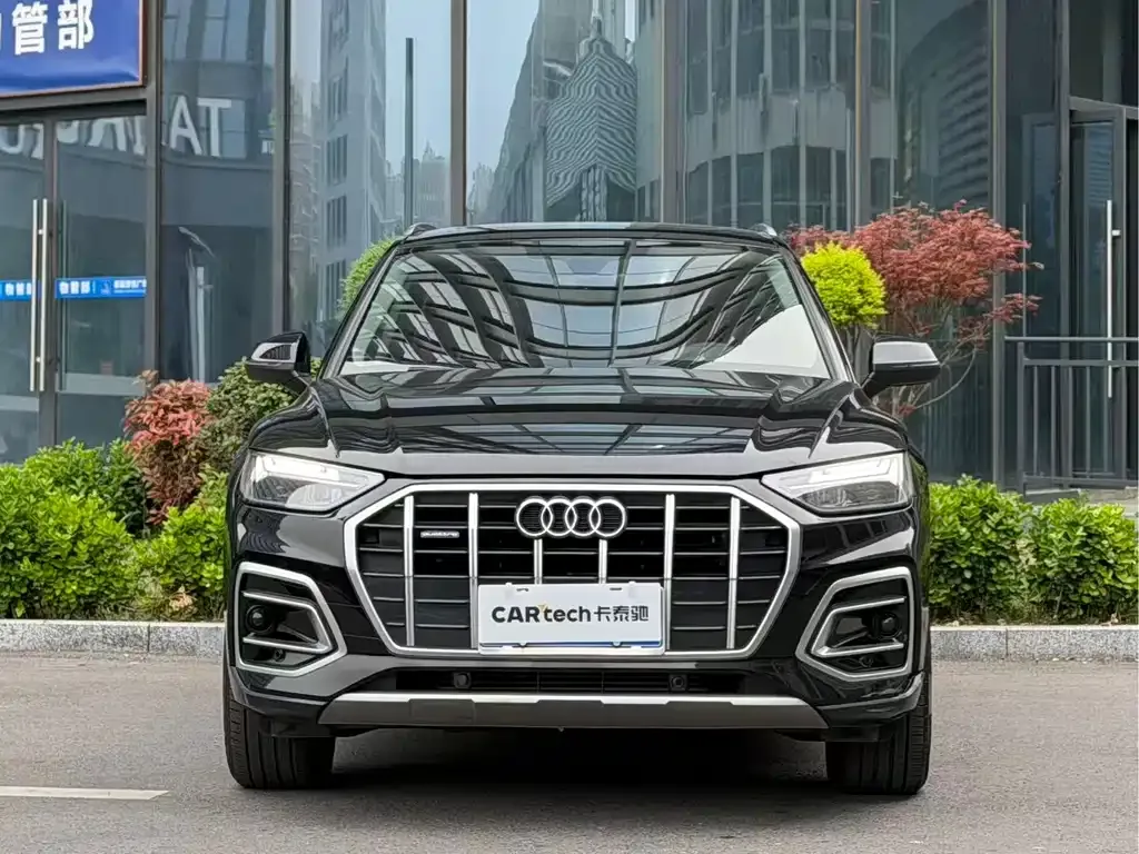 Audi Q5L — фото 10