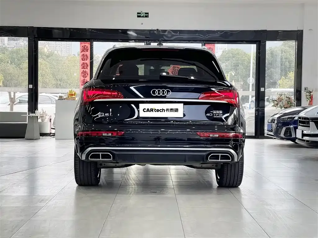 Audi Q5L — фото 5