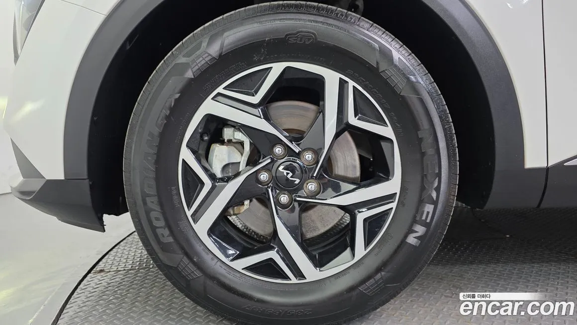 Kia Sportage — фото 10