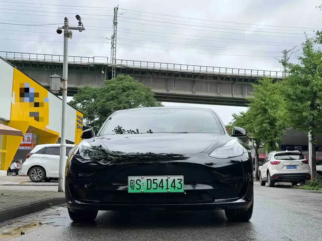 Tesla Model 3 — фото 7