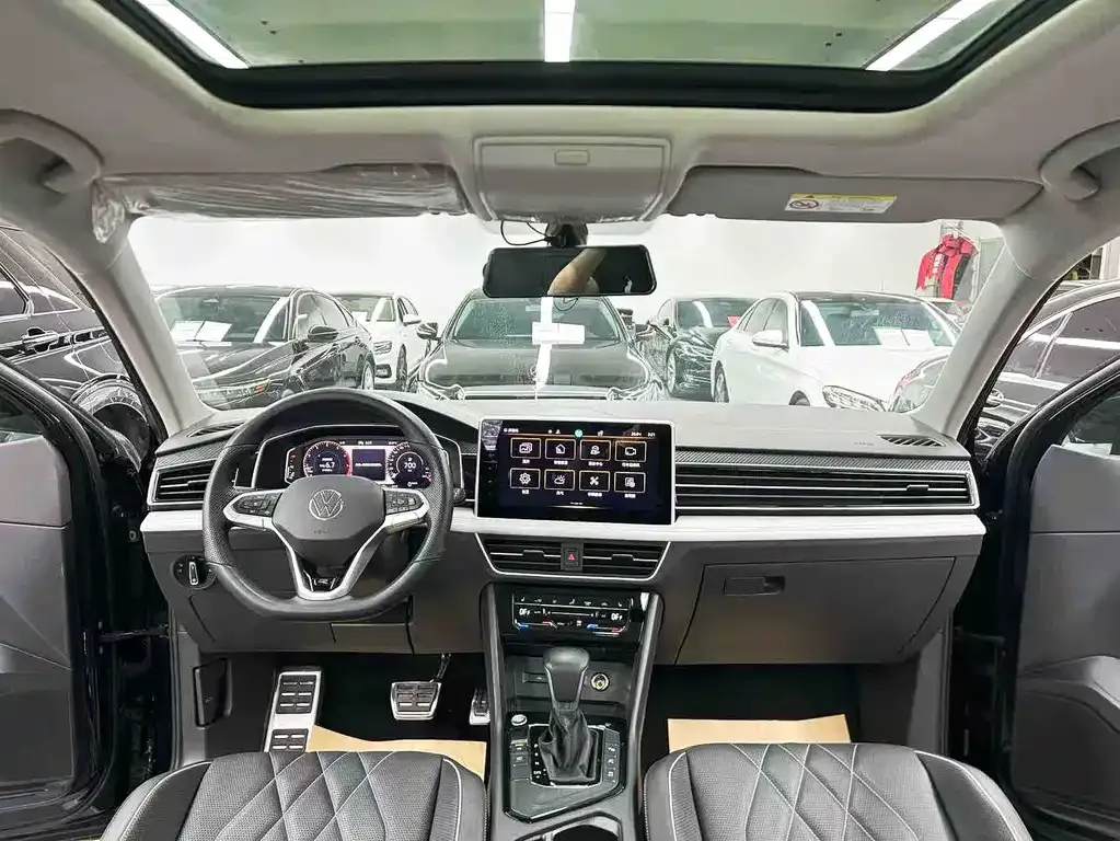 Volkswagen Tiguan L — фото 7