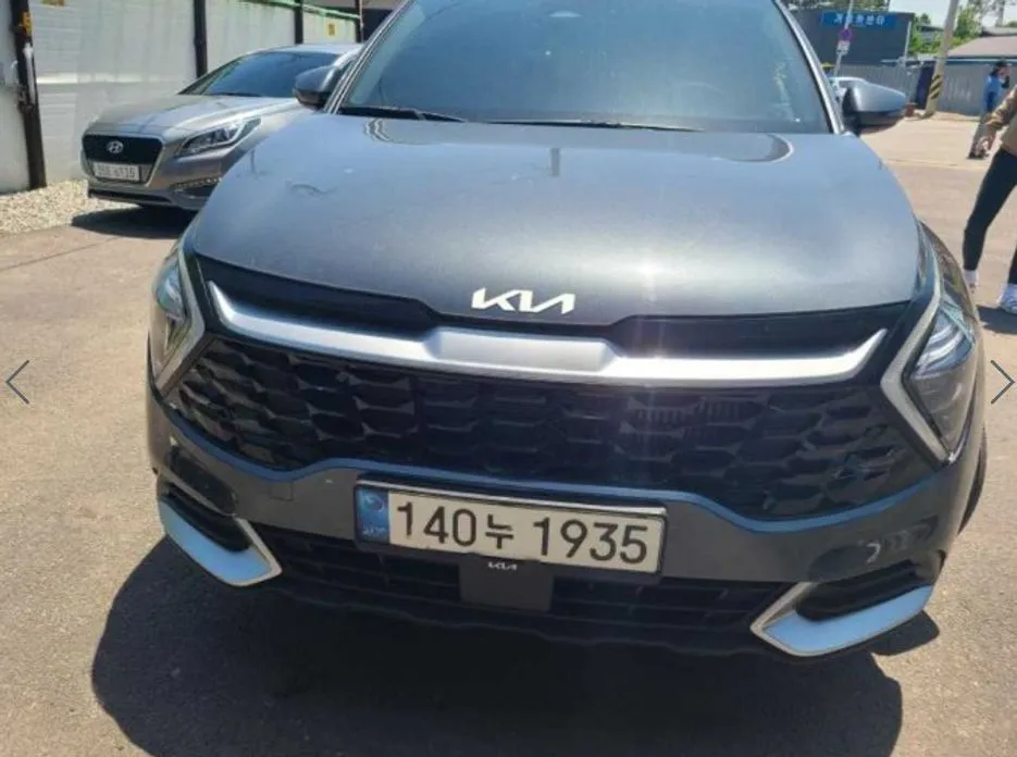 Kia Sportage — фото 1