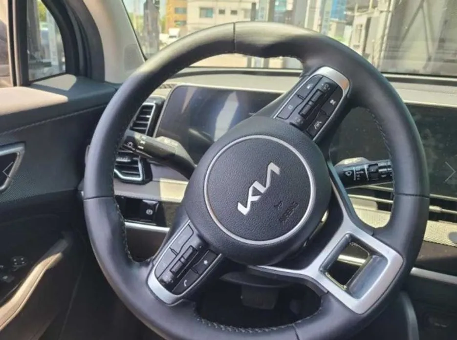 Kia Sportage — фото 9