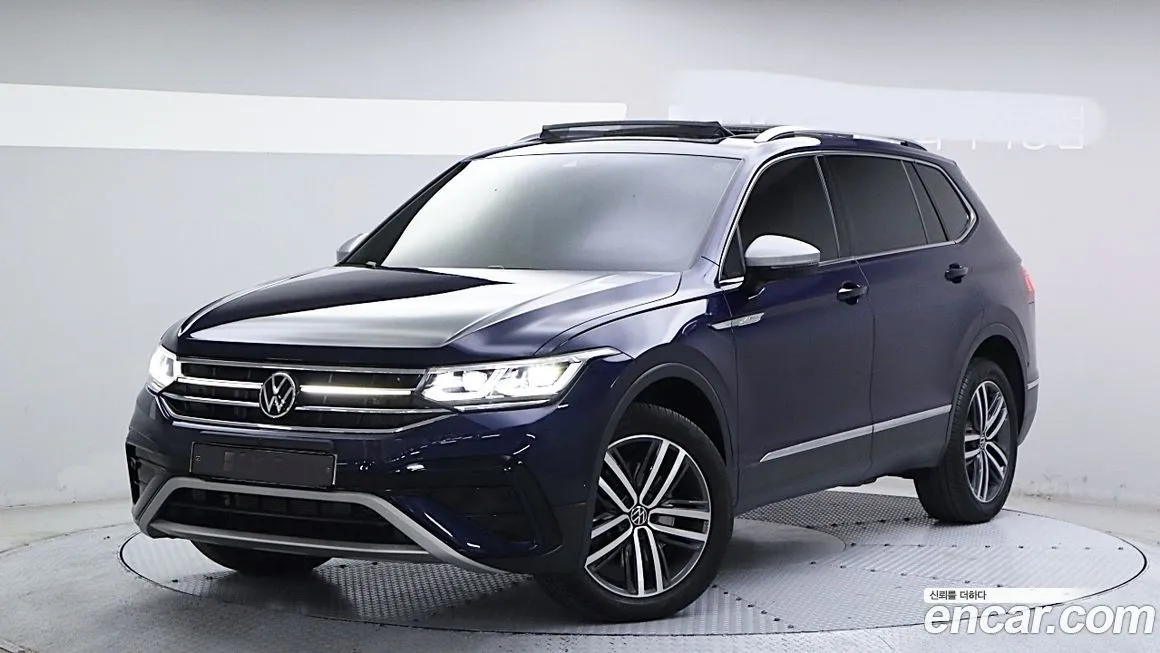 Volkswagen Tiguan — фото 1