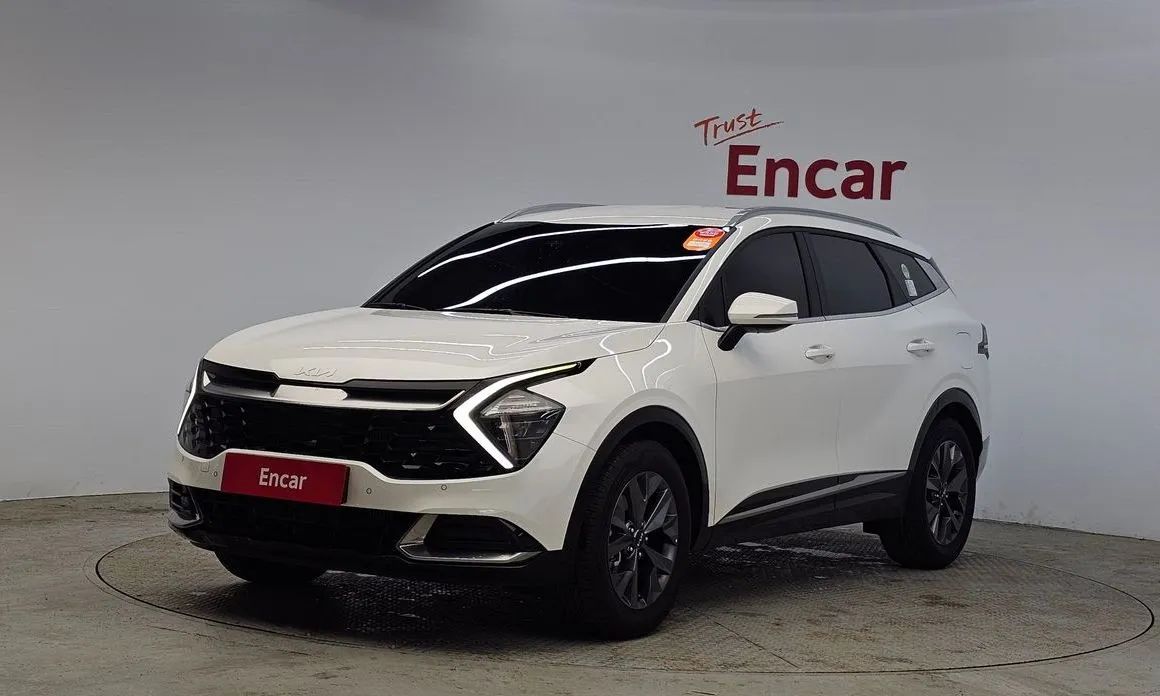 Kia Sportage — фото 1