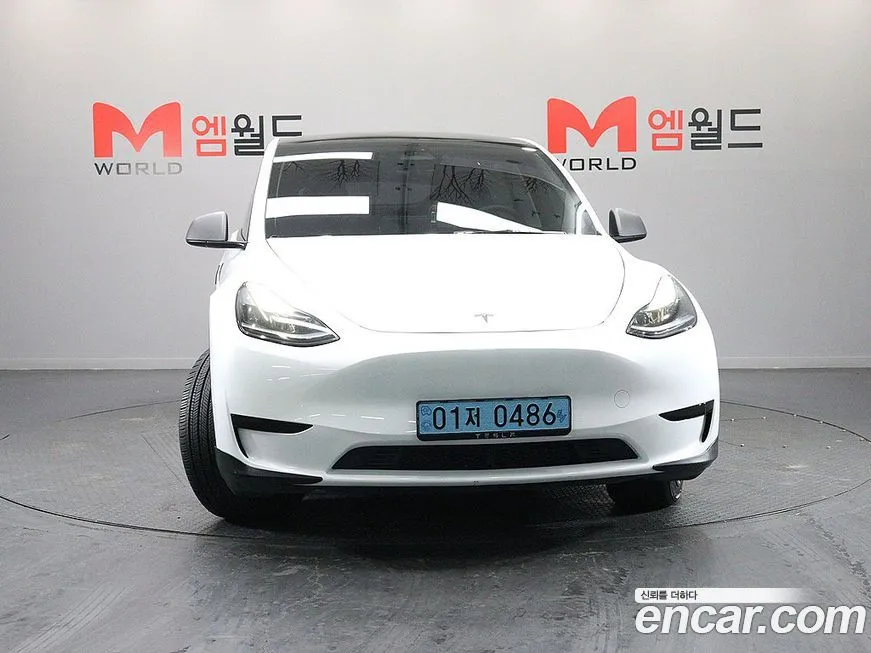 Tesla Model Y — фото 9