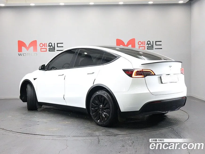 Tesla Model Y — фото 4