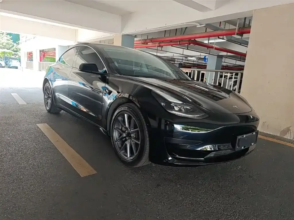 Tesla Model 3 — фото 10