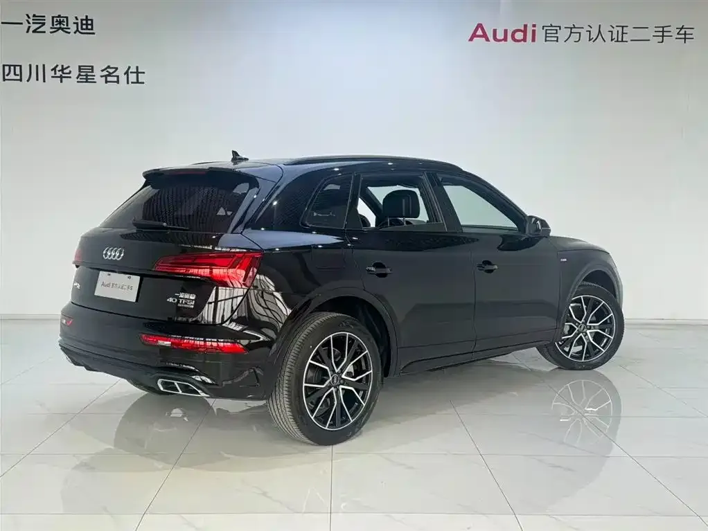Audi Q5L — фото 10