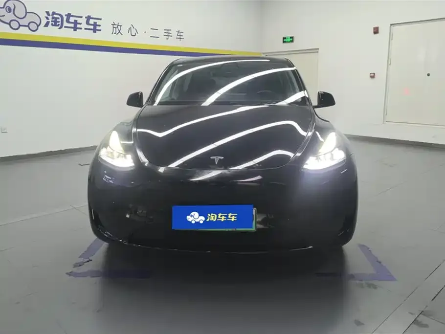 Tesla Model Y — фото 8