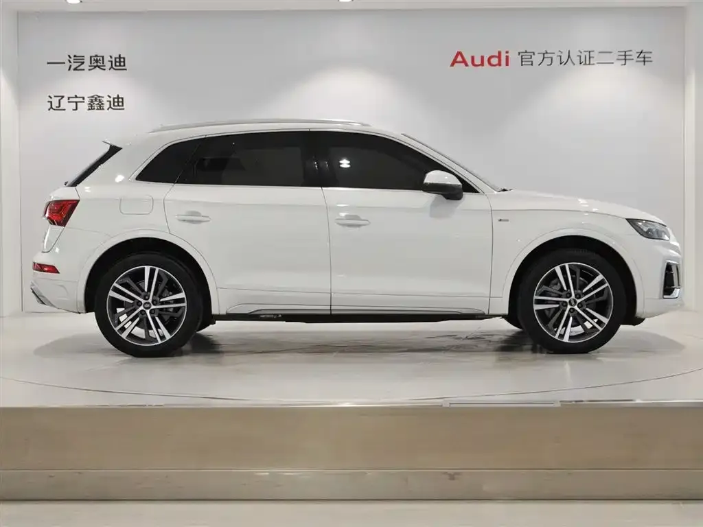 Audi Q5L — фото 5