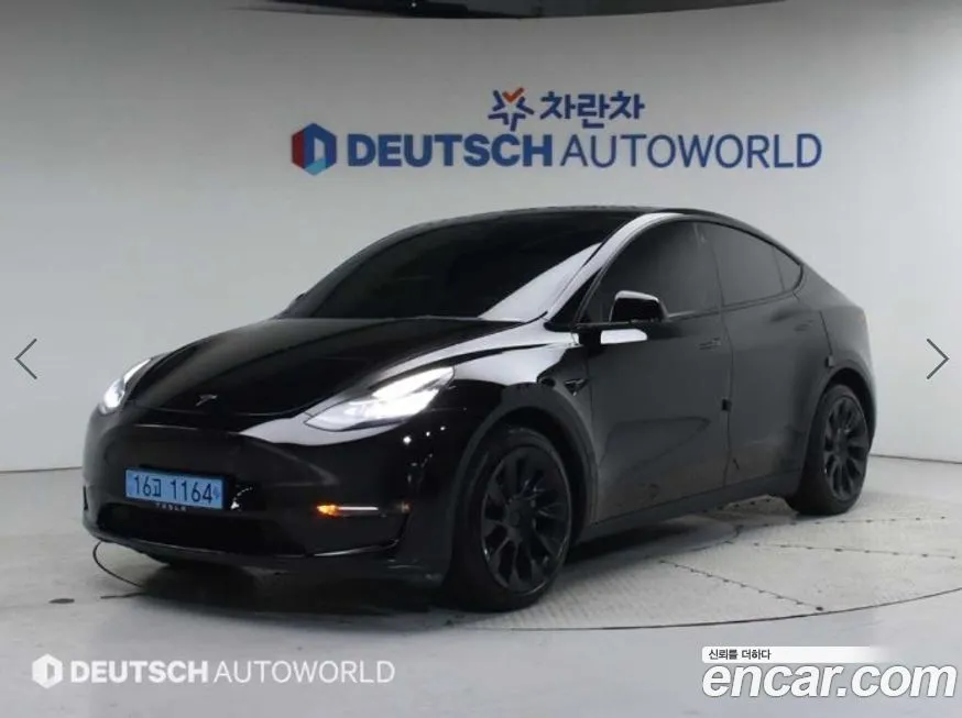 Tesla Model Y — фото 1