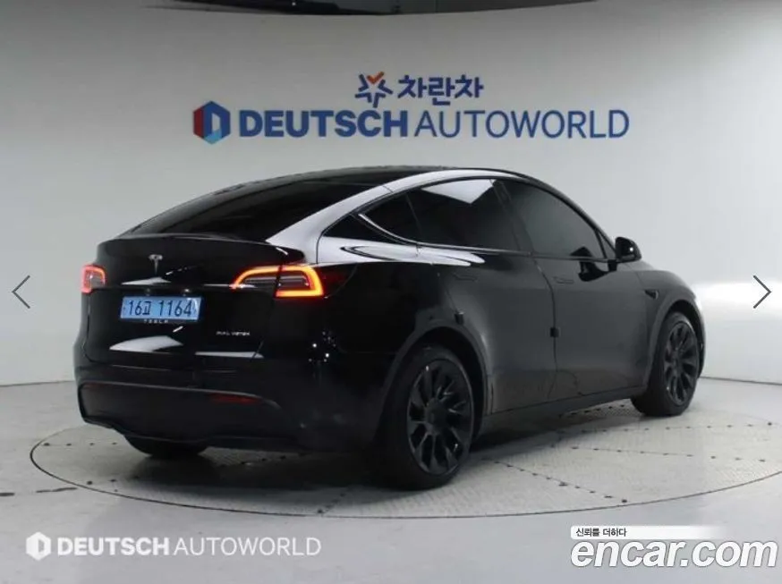 Tesla Model Y — фото 4