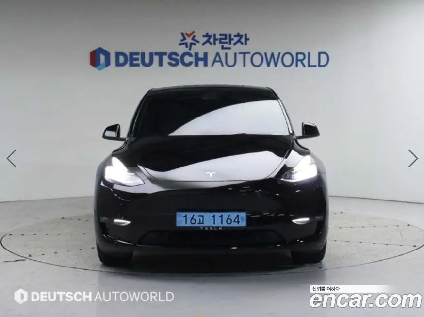 Tesla Model Y — фото 8