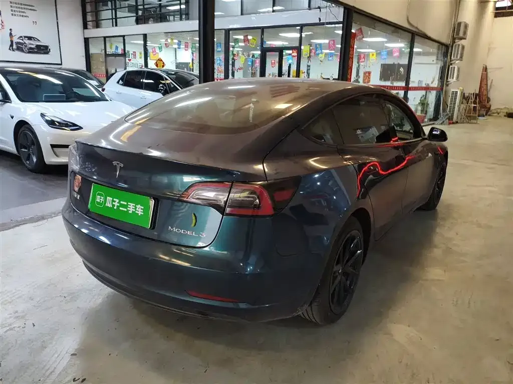 Tesla Model 3 — фото 4