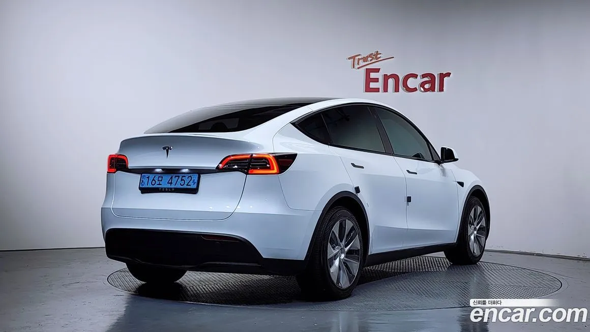 Tesla Model Y — фото 7
