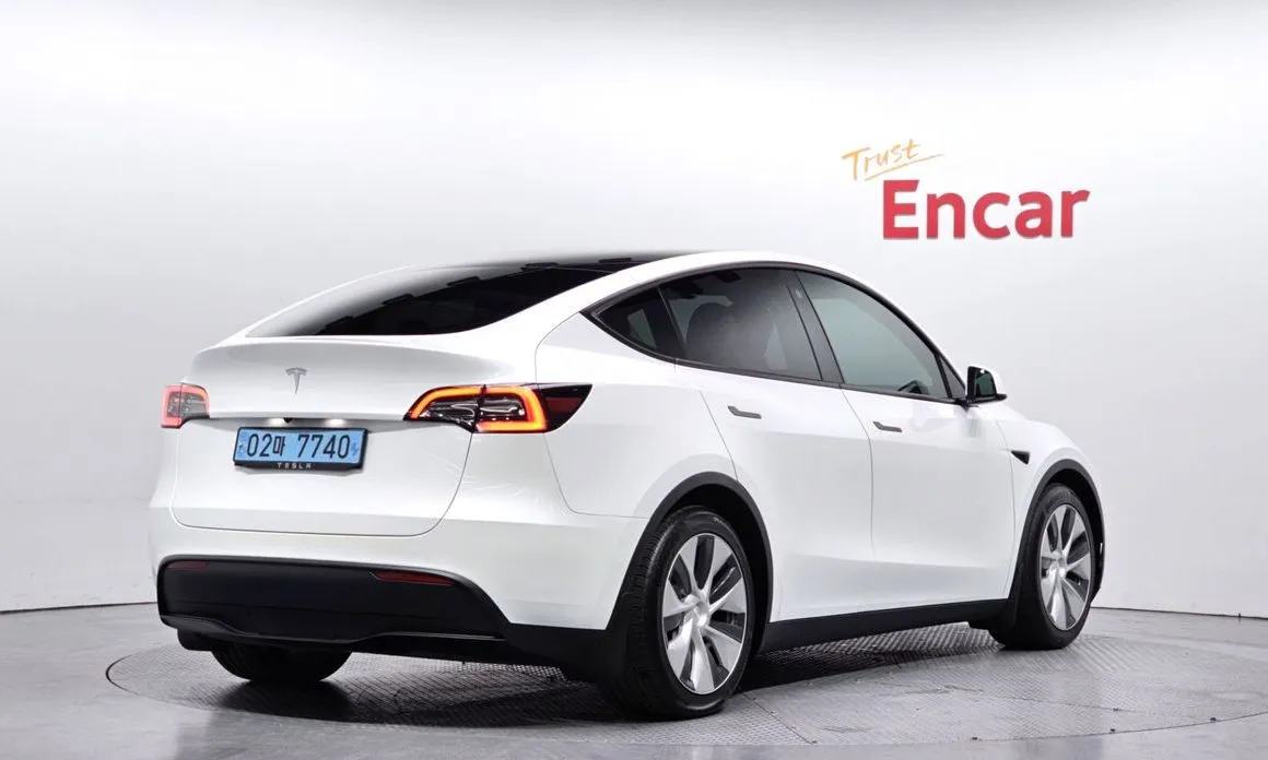 Tesla Model Y — фото 9