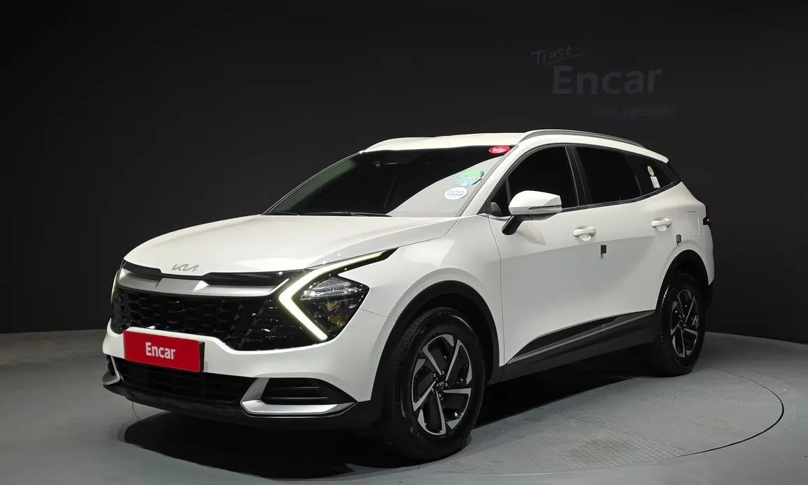 Kia Sportage — фото 1