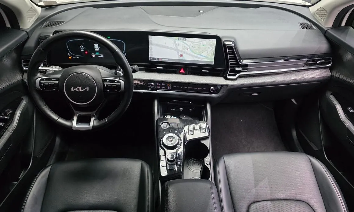 Kia Sportage — фото 10