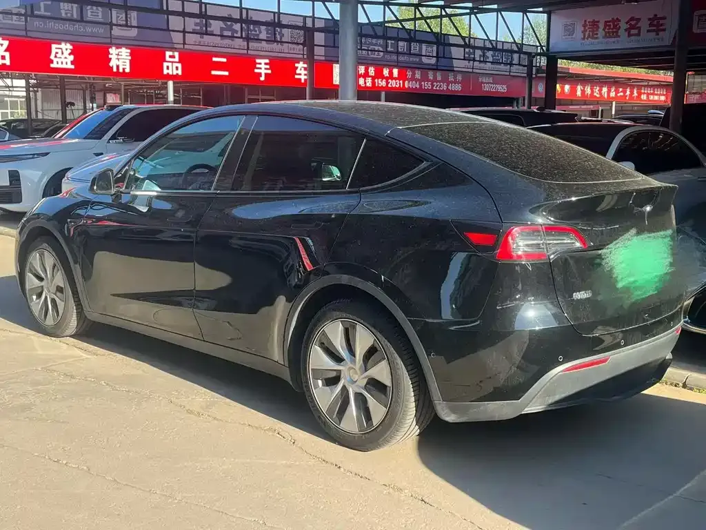 Tesla Model Y — фото 8