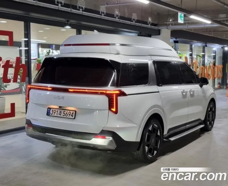 Kia Carnival — фото 10