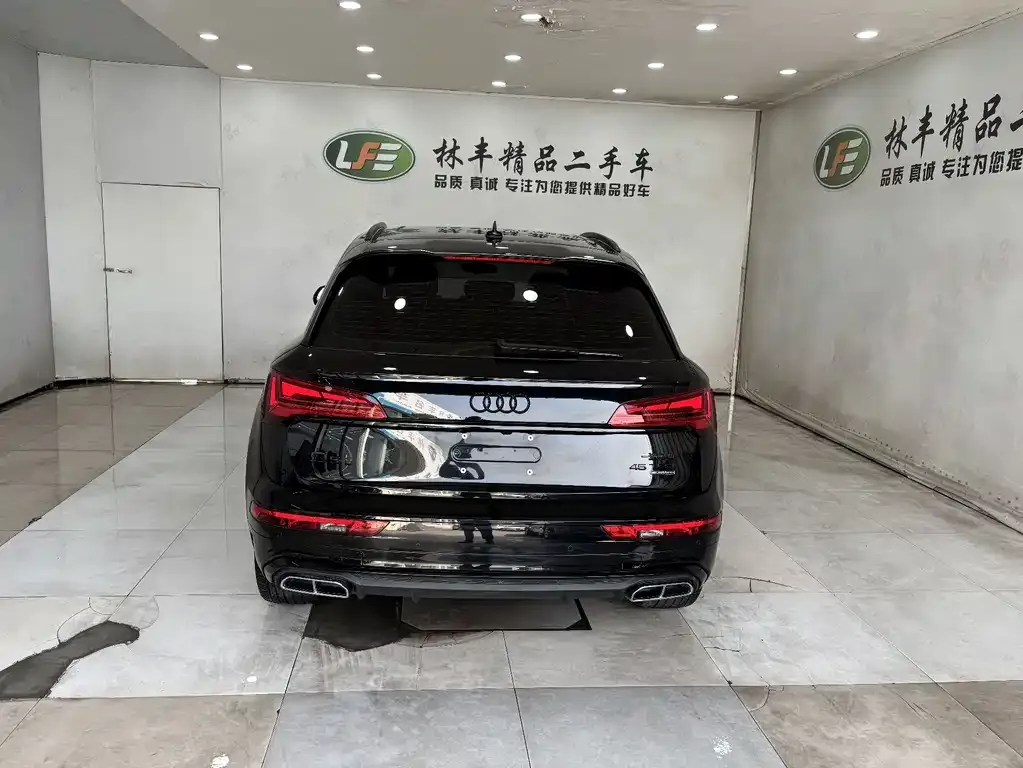 Audi Q5L — фото 10