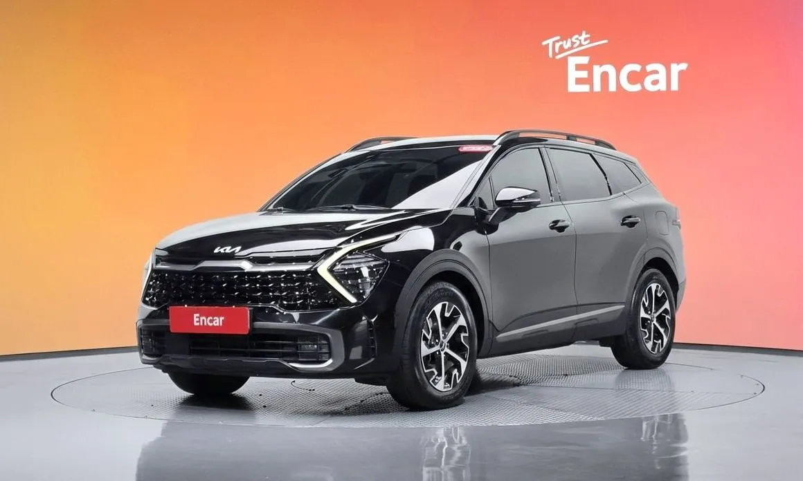 Kia Sportage — фото 1