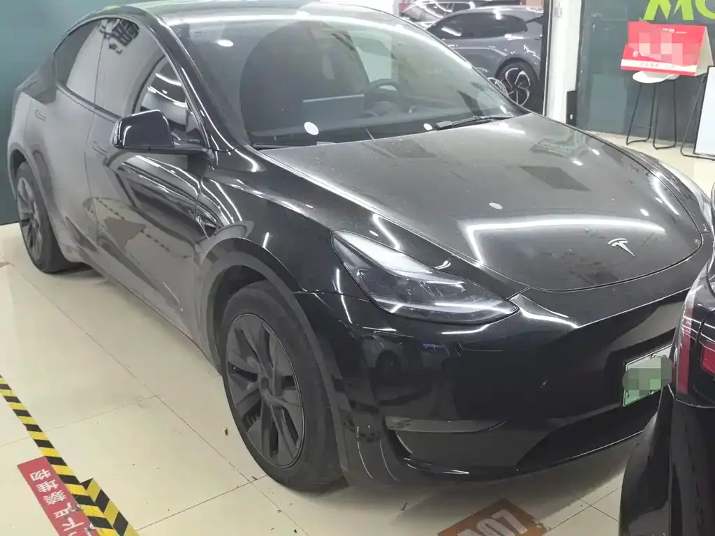 Tesla Model Y — фото 7