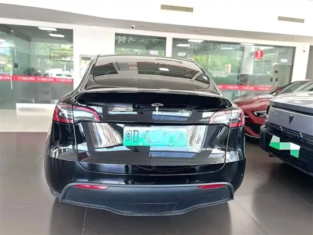 Tesla Model Y — фото 7