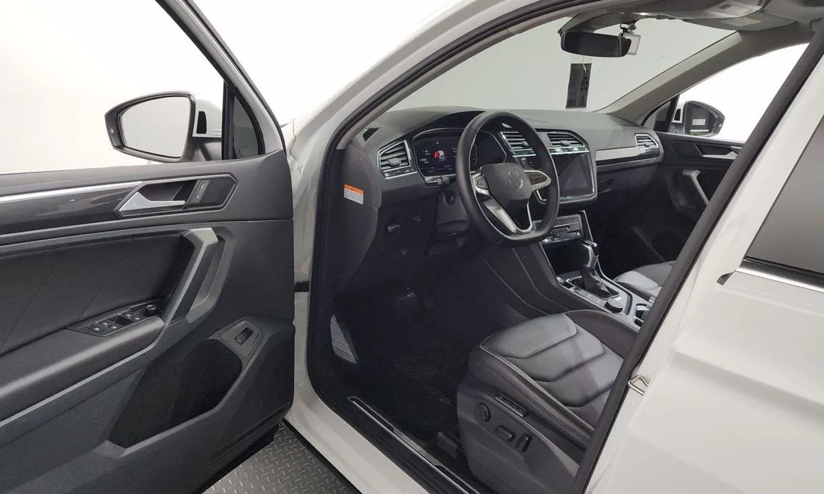 Volkswagen Tiguan — фото 8