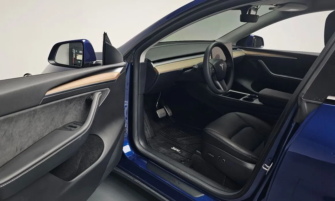 Tesla Model Y — фото 8