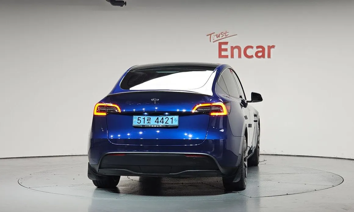 Tesla Model Y — фото 7