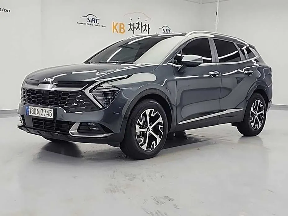 Kia Sportage — фото 1