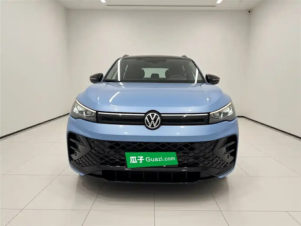 Volkswagen Tiguan L — фото 2