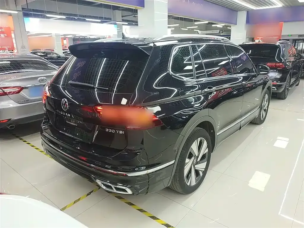 Volkswagen Tiguan L — фото 9