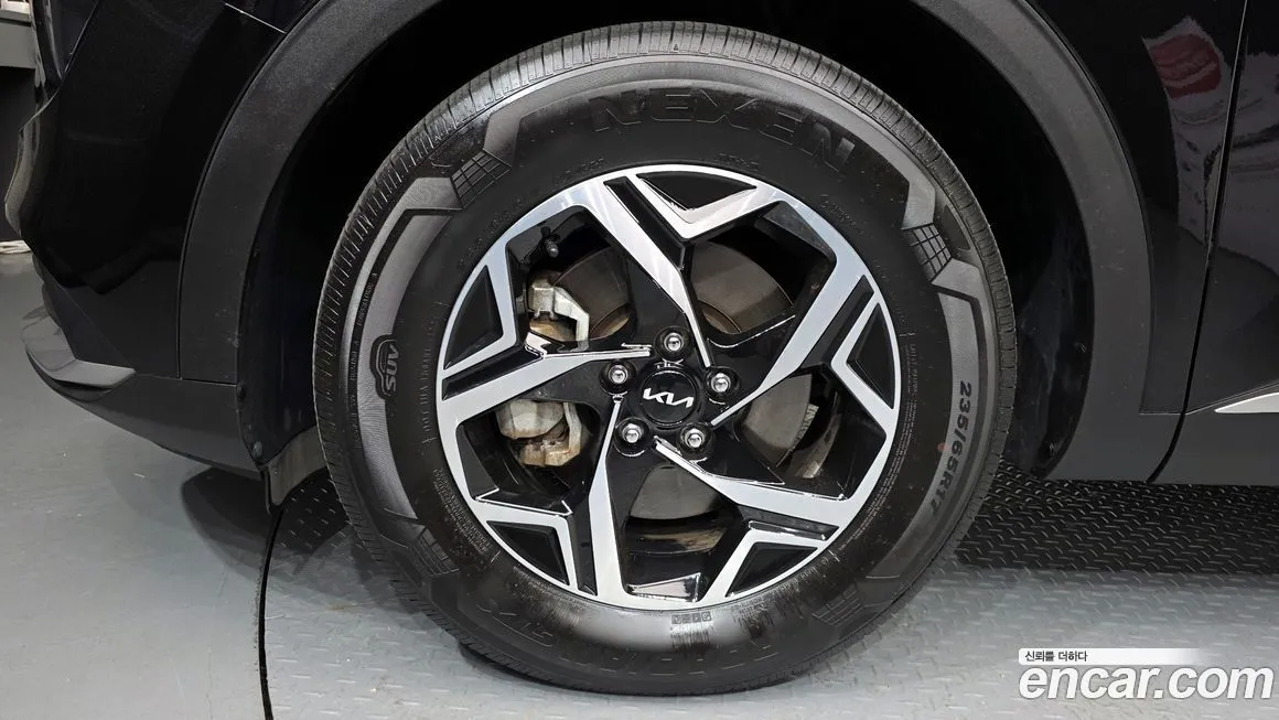 Kia Sportage — фото 10