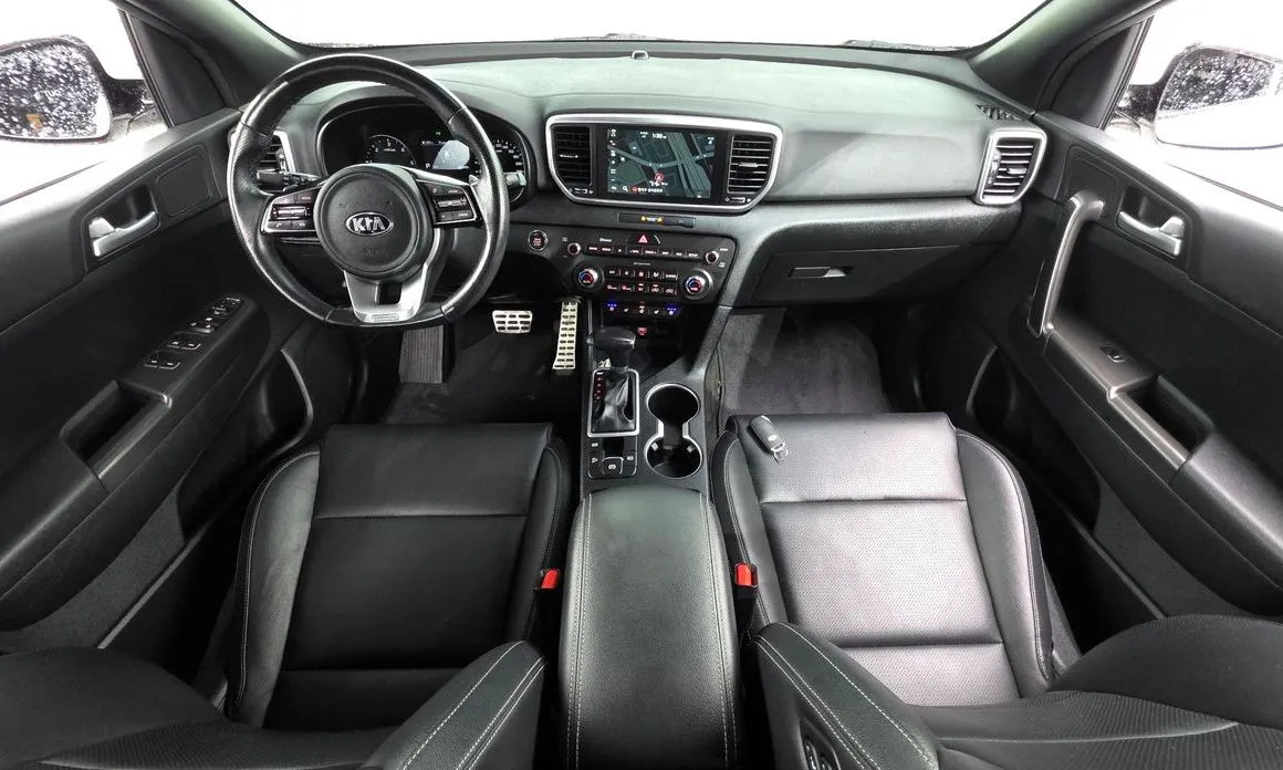 Kia Sportage — фото 8