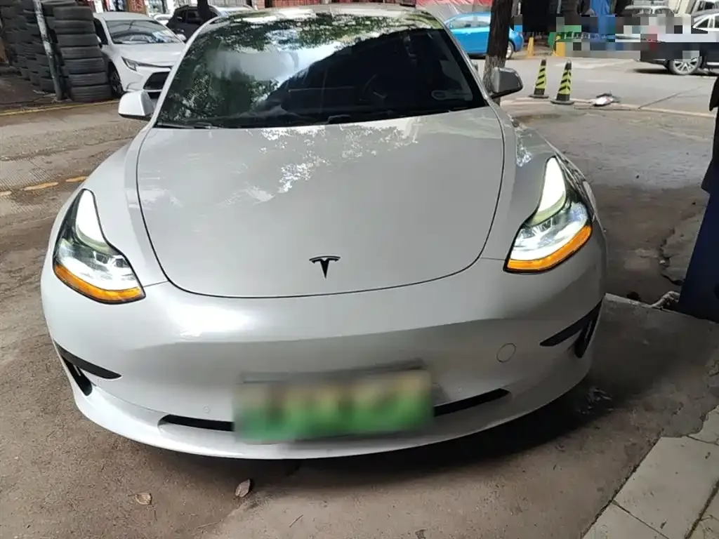 Tesla Model 3 — фото 5