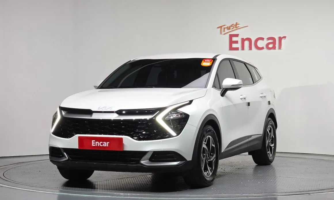 Kia Sportage — фото 1